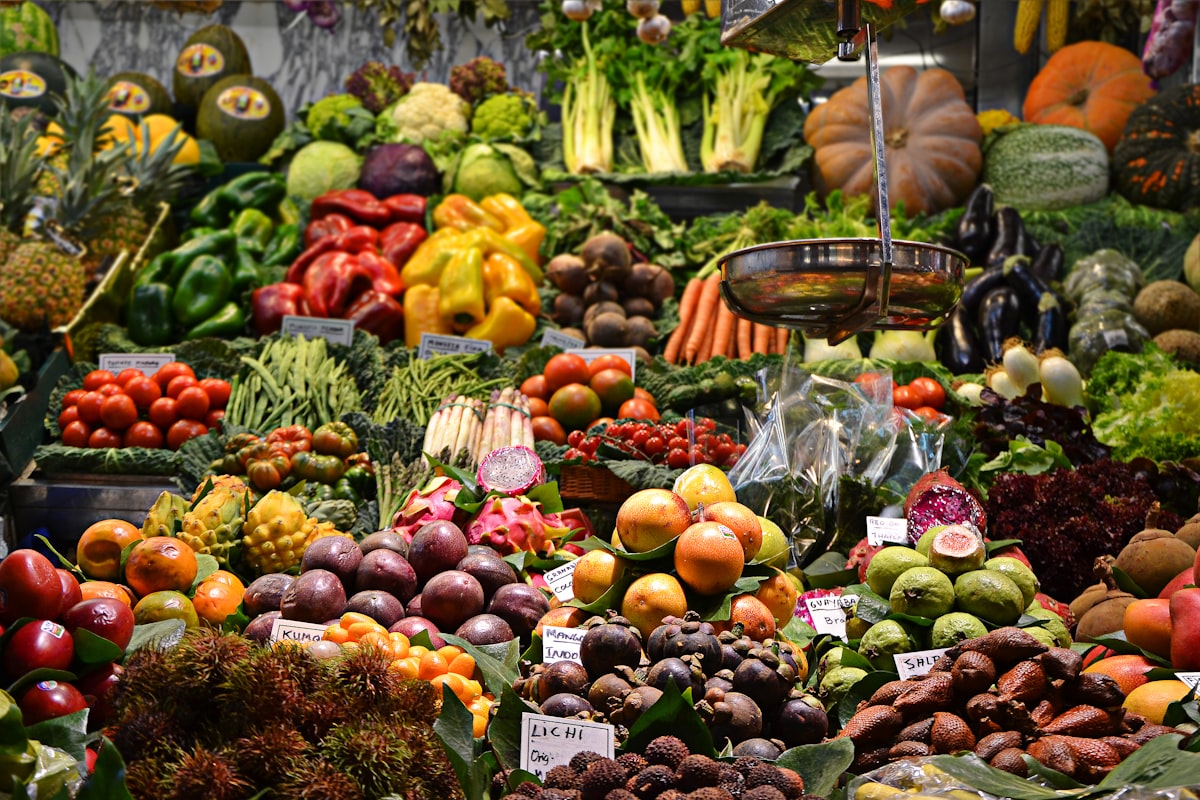 Fresh vegetables and produce at a farmers market — grocery store savings