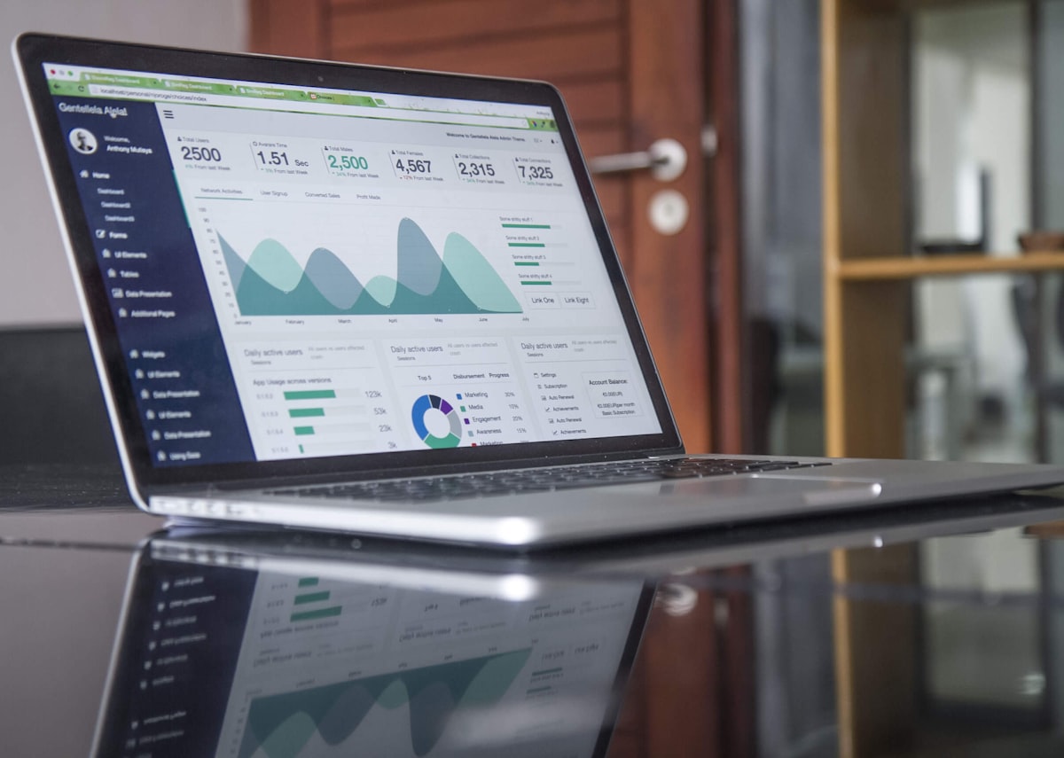 Laptop showing investment portfolio analytics dashboard