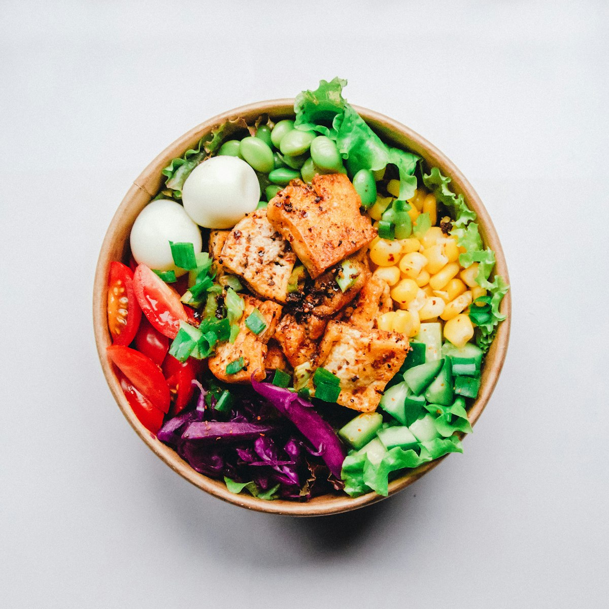 Meal prep containers with healthy food — save money on food budget