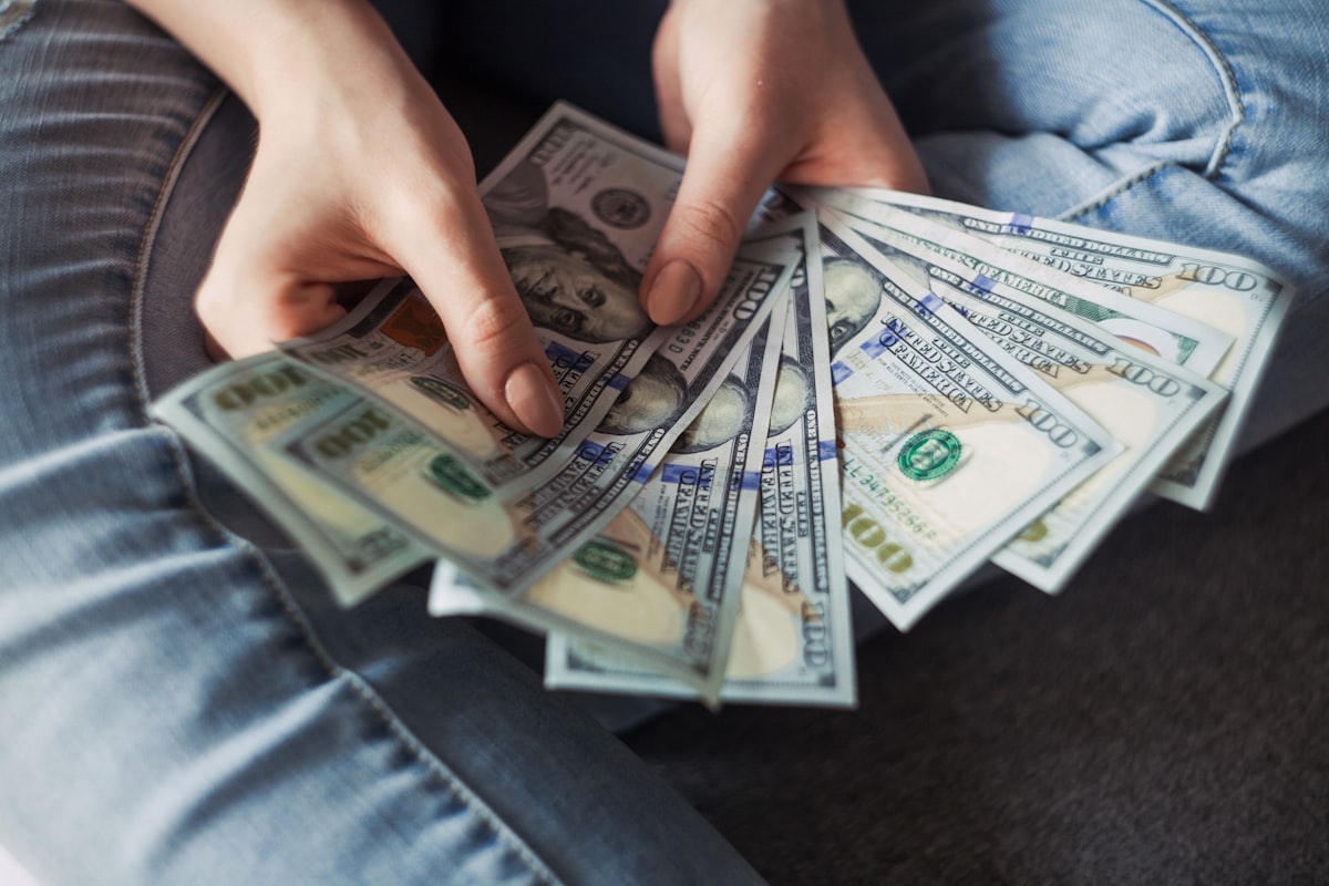 Empty wallet and coins on table — no spend challenge