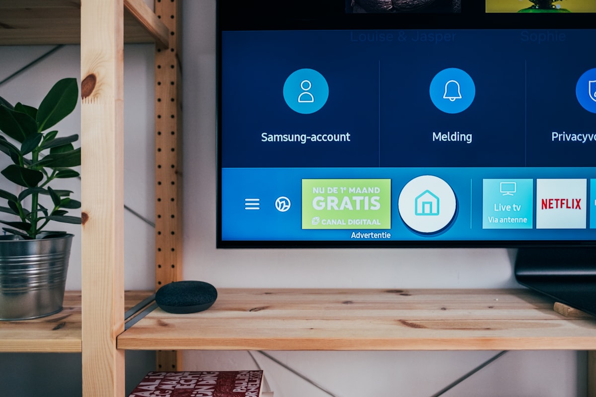 TV screen with streaming service apps — subscription costs