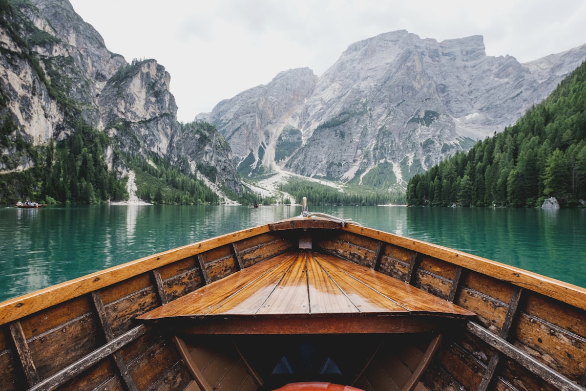 Map and travel planning items on table — budget travel tips